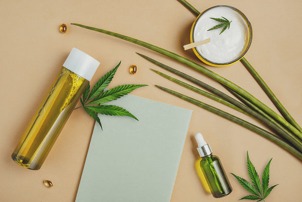 An array of CBD products, CBD Oil Drops, Cannabis, and CBD Lotion,  