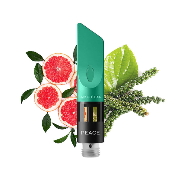 PEACE CBD Vape Cartridge in front of grapefruit and peppercorn 